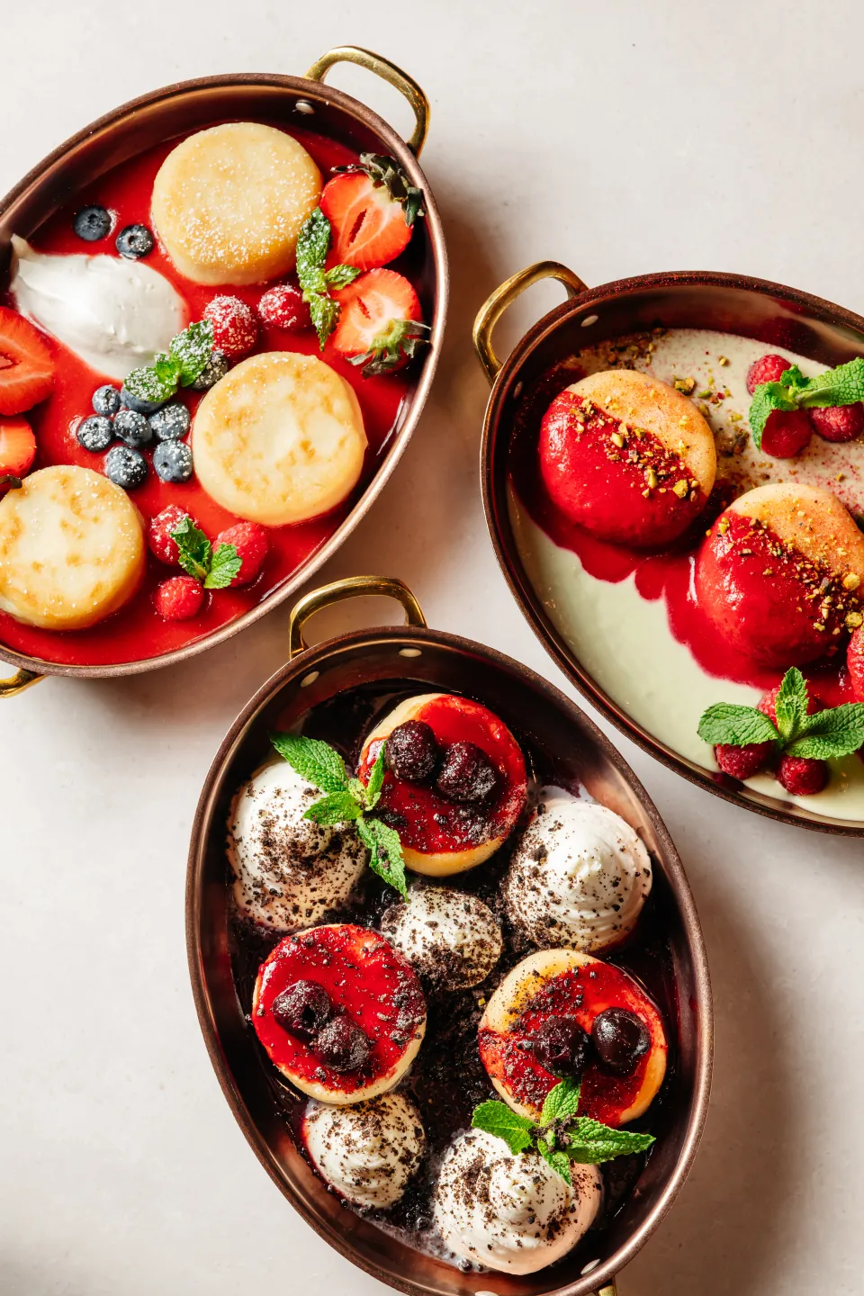 Three colorful Monoblend syrniki dishes